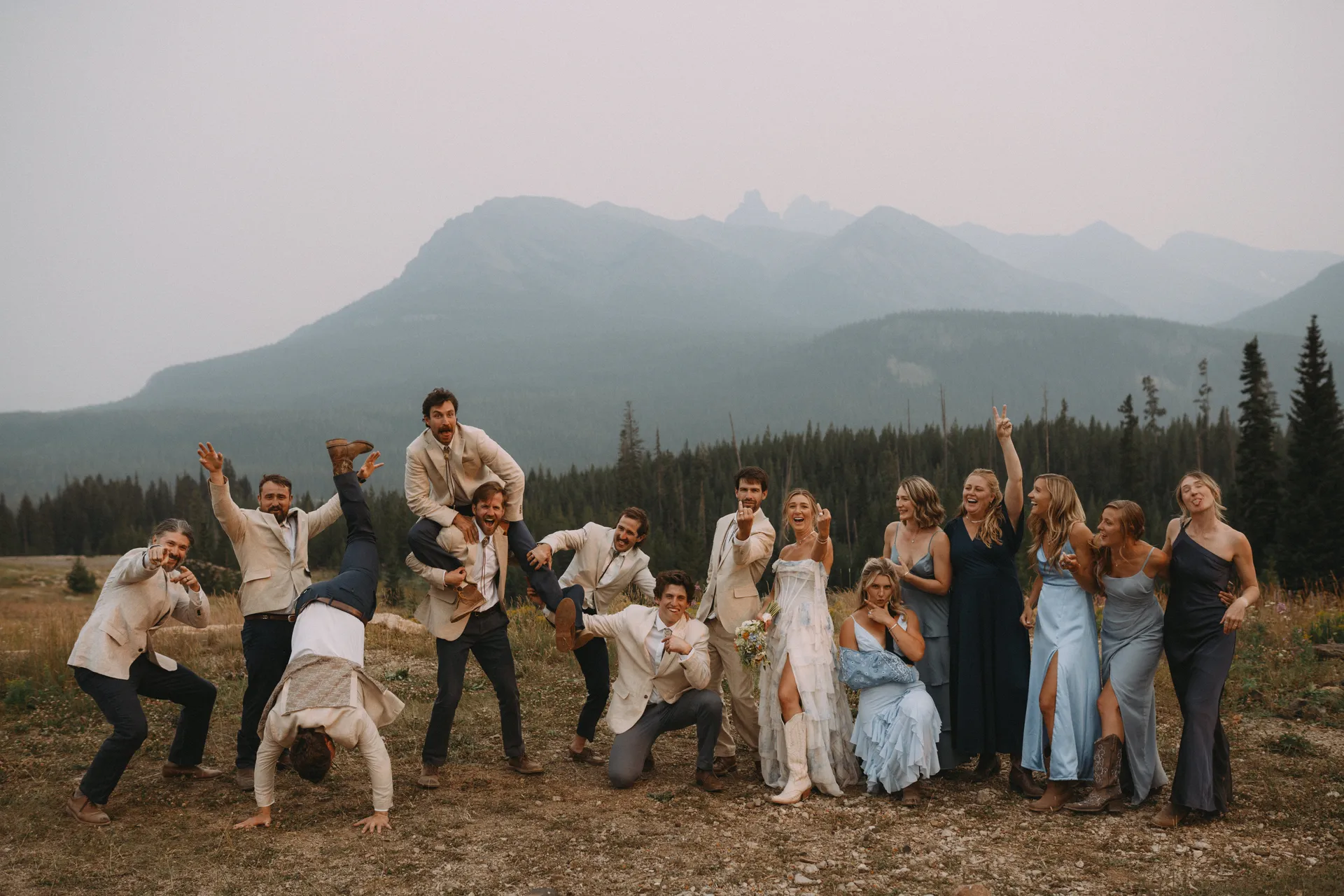 Wedding party celebrating in cooke city, montana, photographed by wade snider